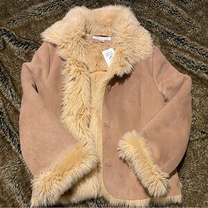 Vintage jacket, bought and never worn. Fits like a true Medium